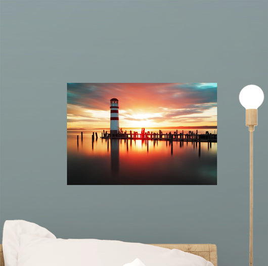 Beach sunrise with lighthouse