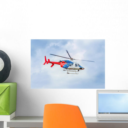 Colorful helicopter moving in the sky