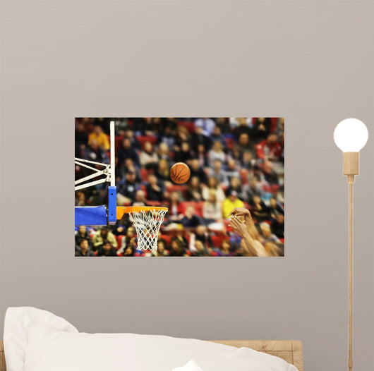Scoring the winning points at a basketball game