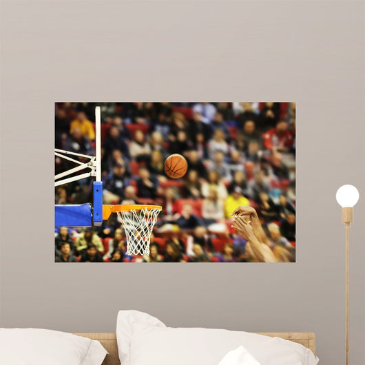 Scoring the winning points at a basketball game