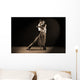 Latino dancers in ballroom against on black Wall Mural