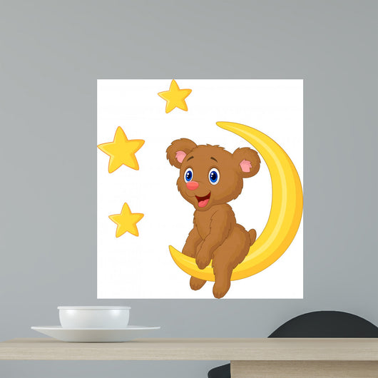 Baby bear sitting on the moon Wall Mural