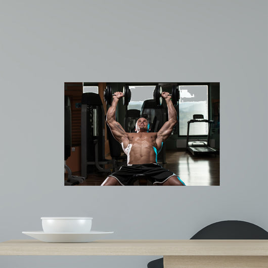 Man Doing Dumbbell Incline Bench Press Workout