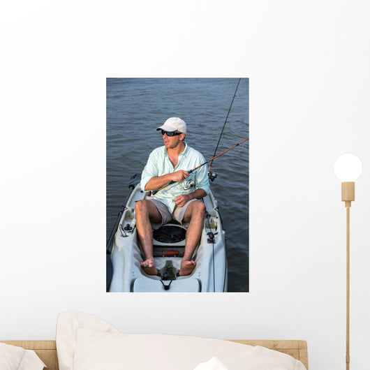 Man Fishing in Kayak Wall Mural