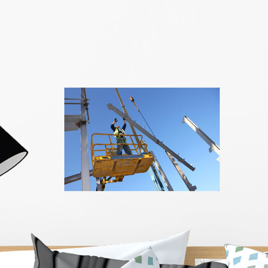 Steel Worker on cherry picker Wall Mural