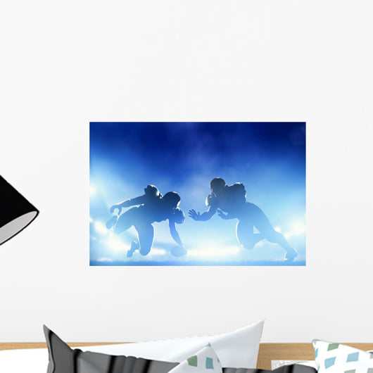 American football players in game, touchdown. Stadium lights Wall Mural