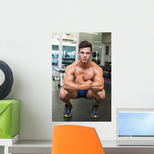 Shirtless Muscular Man Flexing Muscles in Gym Wall Mural
