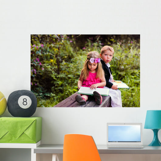 Little preschooler kid reading outdoor Wall Mural