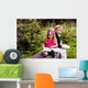 Little preschooler kid reading outdoor Wall Mural