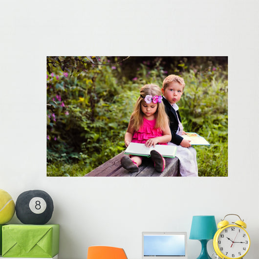 Little preschooler kid reading outdoor Wall Mural