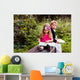 Little preschooler kid reading outdoor Wall Mural