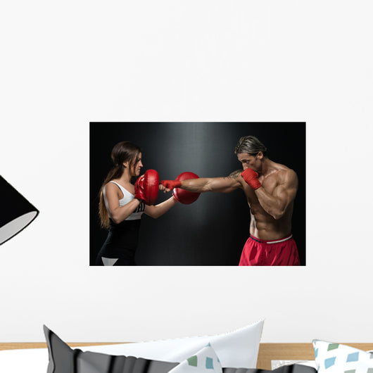 Young Fit Man Fighting A Woman Wall Mural