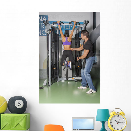Male & Female Training in Gym Wall Mural