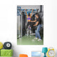 Male & Female Training in Gym Wall Mural