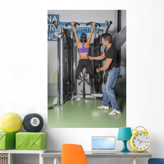 Male & Female Training in Gym Wall Mural