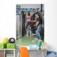 Male & Female Training in Gym Wall Mural