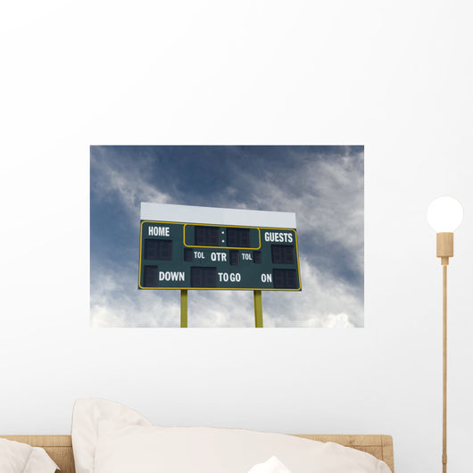 american football scoreboard with blue sky Wall Mural