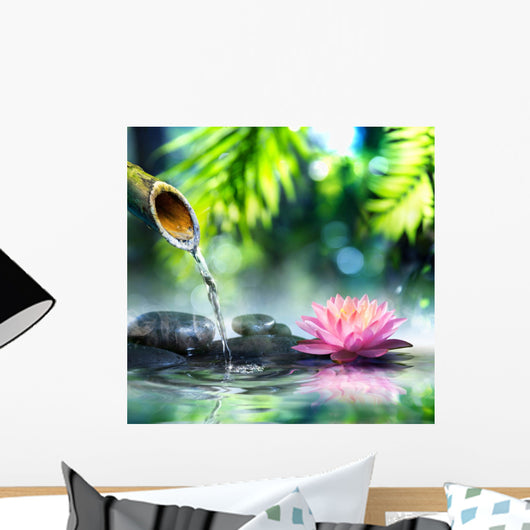 zen garden with black stones and pink waterlily Wall Mural