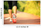 young fitness woman legs walking on forest trail  Wall Mural