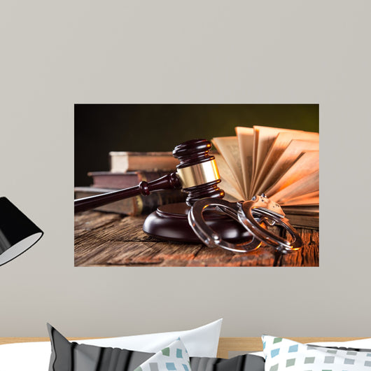 Wooden gavel and books on wooden table, law concept Wall Mural