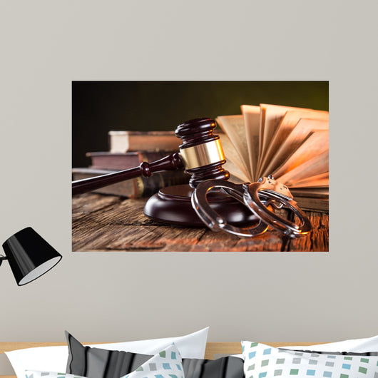 Wooden gavel and books on wooden table, law concept Wall Mural