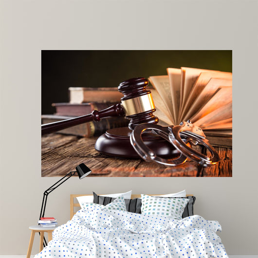 Wooden gavel and books on wooden table, law concept Wall Mural