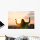 Blissful woman celebrating sport and fitness lifestyle success Wall Mural