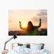 Blissful woman celebrating sport and fitness lifestyle success Wall Mural