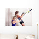 Athletic woman and personal trainer Wall Mural