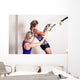 Athletic woman and personal trainer Wall Mural