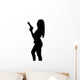 Silhouette of young sexy woman with gun Wall Decal