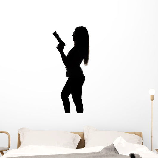 Silhouette of young sexy woman with gun Wall Decal