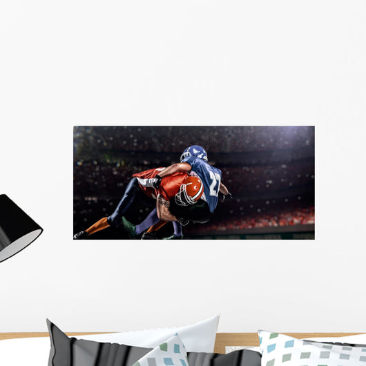 American football player in action at game time Wall Mural