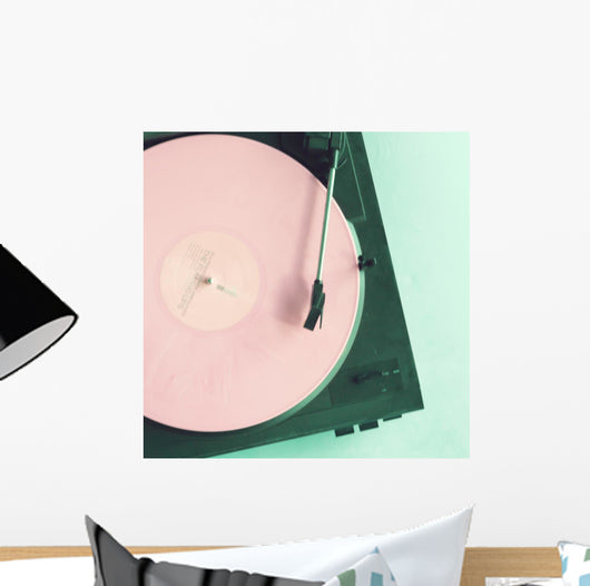 Vintage turntable with pink vinyl record Wall Mural