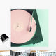 Vintage turntable with pink vinyl record Wall Mural