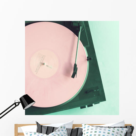 Vintage turntable with pink vinyl record Wall Mural