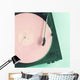 Vintage turntable with pink vinyl record Wall Mural