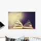 Opened book on a table. Wall Mural