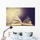 Opened book on a table. Wall Mural