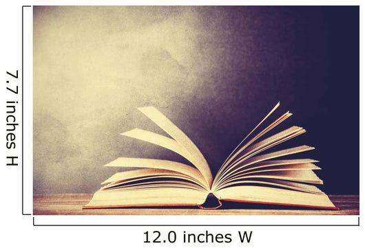 Opened book on a table. Wall Mural