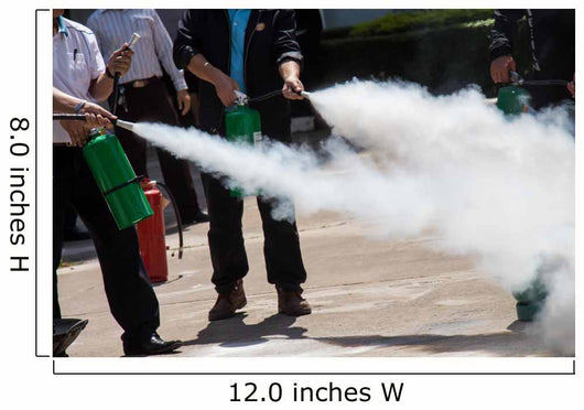 Instructor showing how to use a fire extinguisher on a training Wall Mural