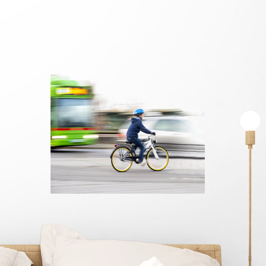 Young boy on bike Wall Mural