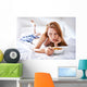 woman in bed eating chicken noodle soup while sick Wall Mural