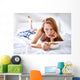 woman in bed eating chicken noodle soup while sick Wall Mural
