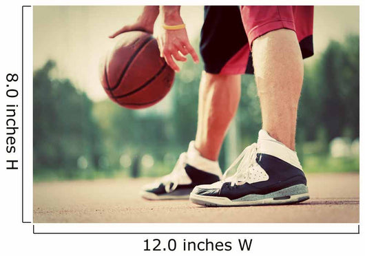 Young man on basketball court dribbling with bal Wall Mural