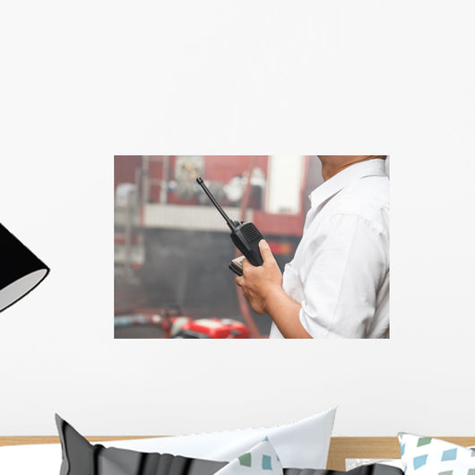 Man using walkie talkie Wall Mural