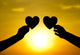 hands holding hearts silhouette Wall Mural