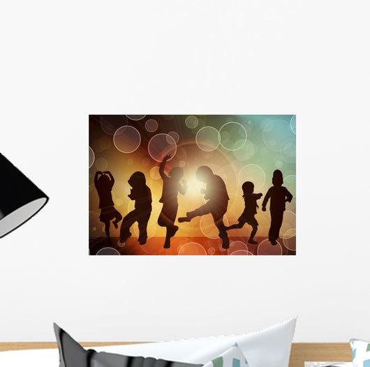 Dancing children silhouettes Wall Mural
