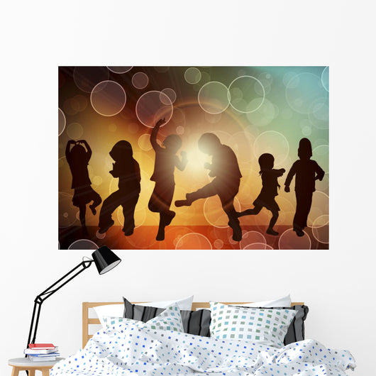 Dancing children silhouettes Wall Mural