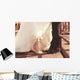 Bride and groom legs on a bridge Wall Mural